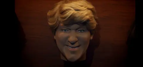 BBC/Studio Lambert Claire Balding's plastic head, which looks like "Boris Johnson"