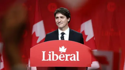 Getty Images Canada's Prime Minister Justin Trudeau speaks before Mark Carney was elected as Canada's Liberal Leader and Prime Minister-elect during the election of the new Liberal Party leader in Ottawa on March 9, 2025. 